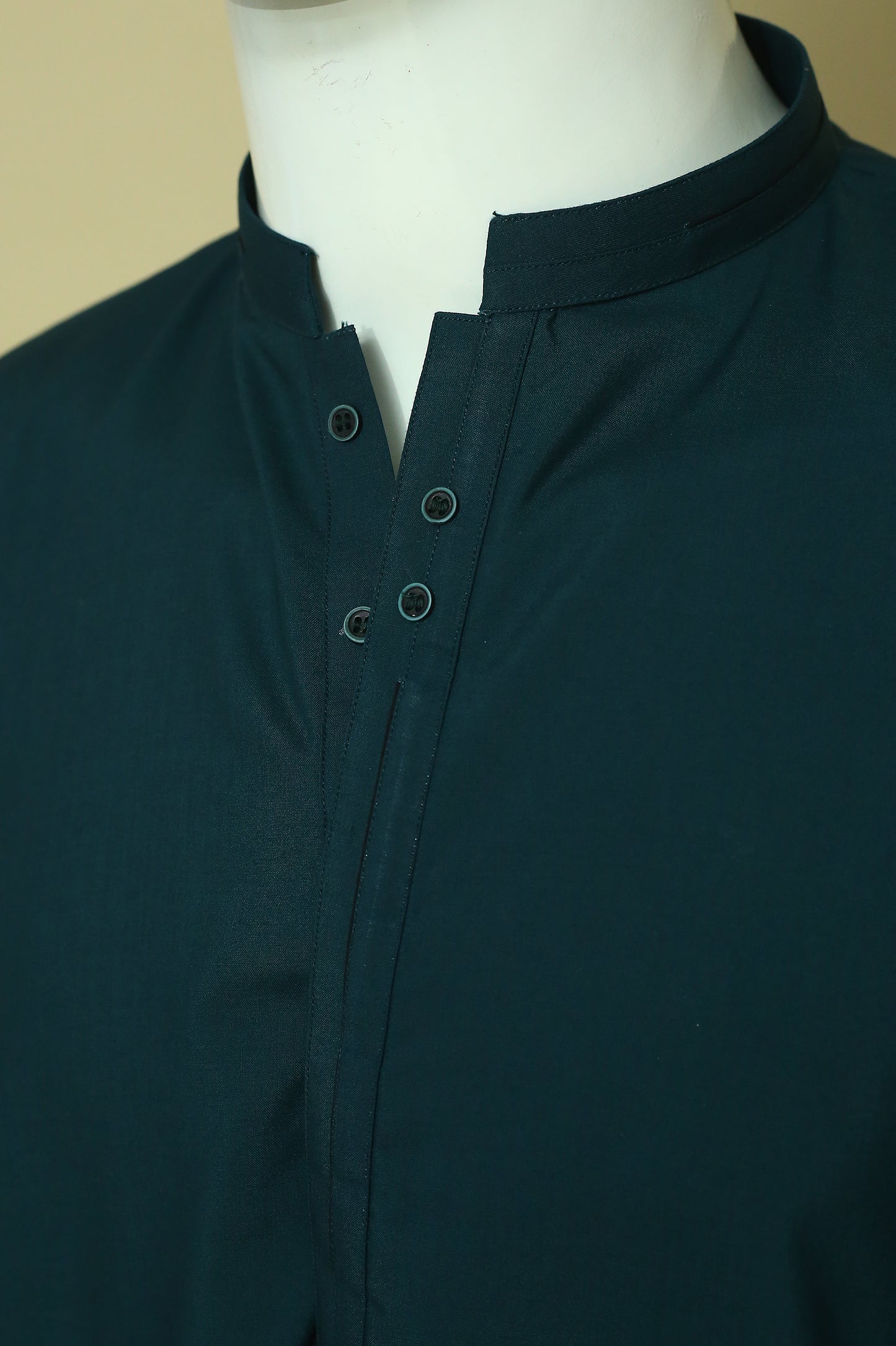 Premium Green Shalwar Qameez with sherwani-style collar and patti work. Soft, breathable wash n wear fabric perfect for daily and event wear.